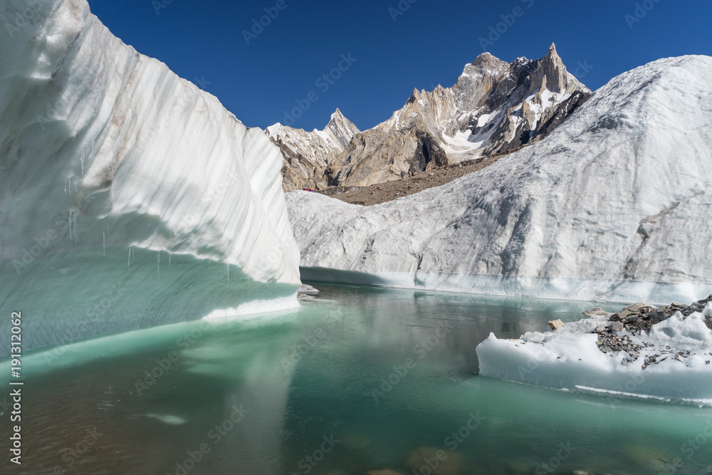 Fototapeta premium Small lake inside Baltoro glacier, K2 trek, Karakoram range, Pakistan