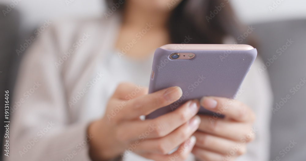 Close up of woman using smart phone