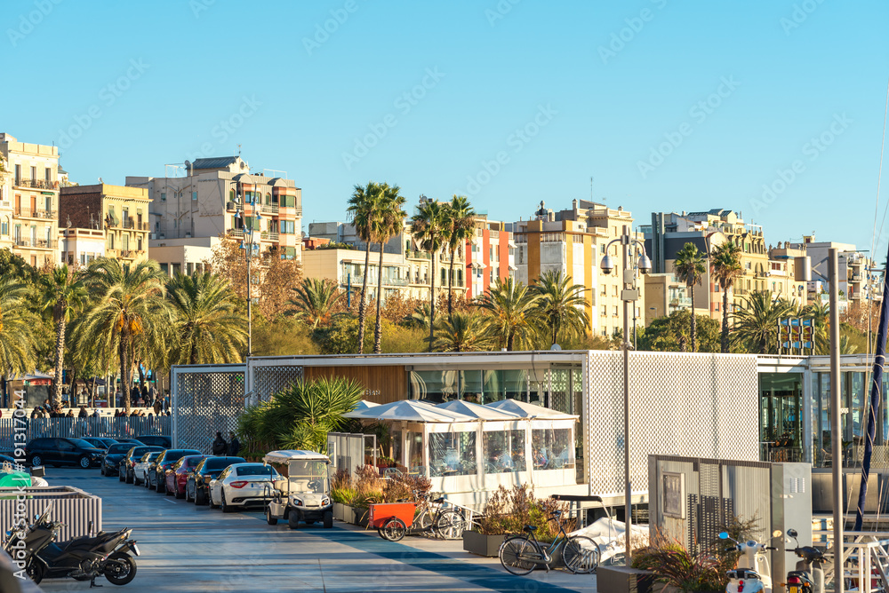 Row of different town houses at the harbor side from the Barceloneta district of Barcelona