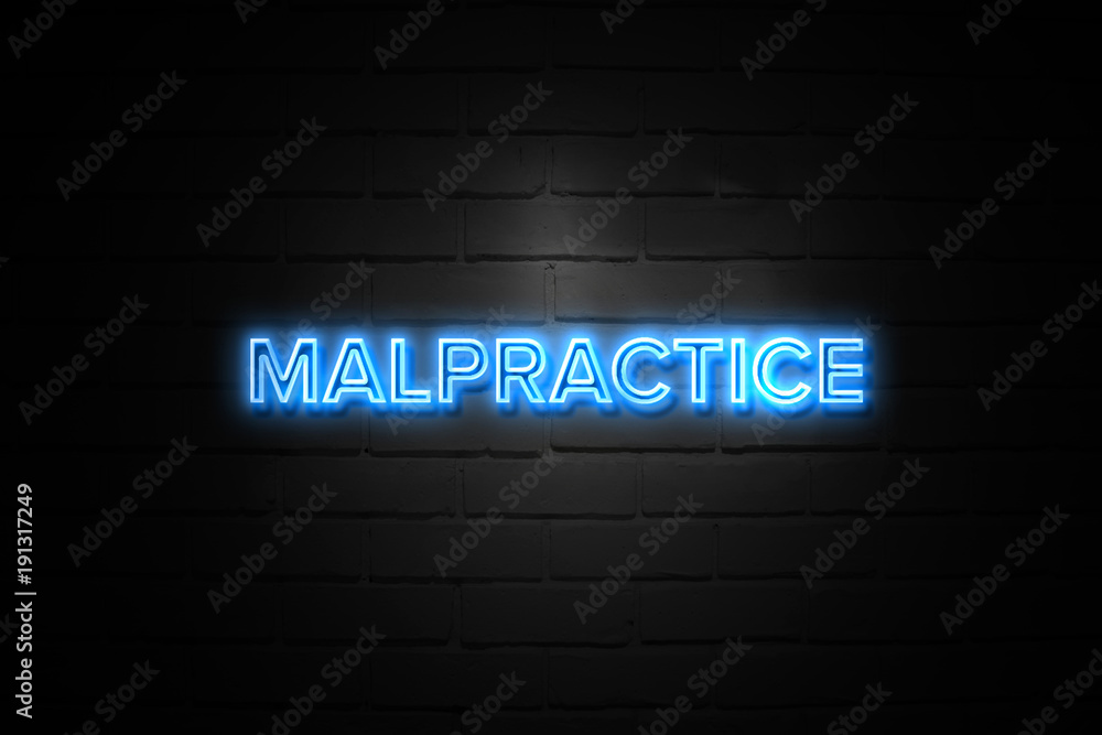 Malpractice neon Sign on brickwall Malpractice neon Sign on brickwall