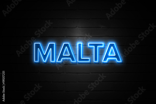 Malta neon Sign on brickwall
