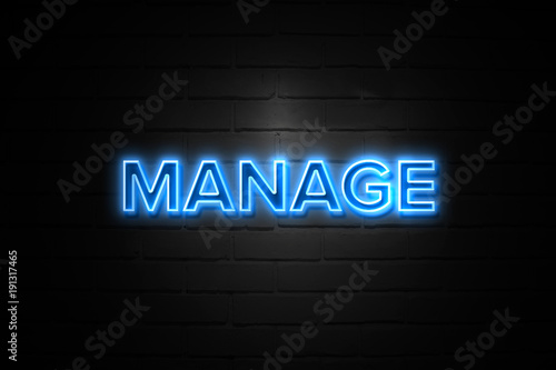 Manage neon Sign on brickwall