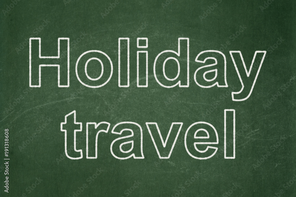 Obraz premium Vacation concept: text Holiday Travel on Green chalkboard background