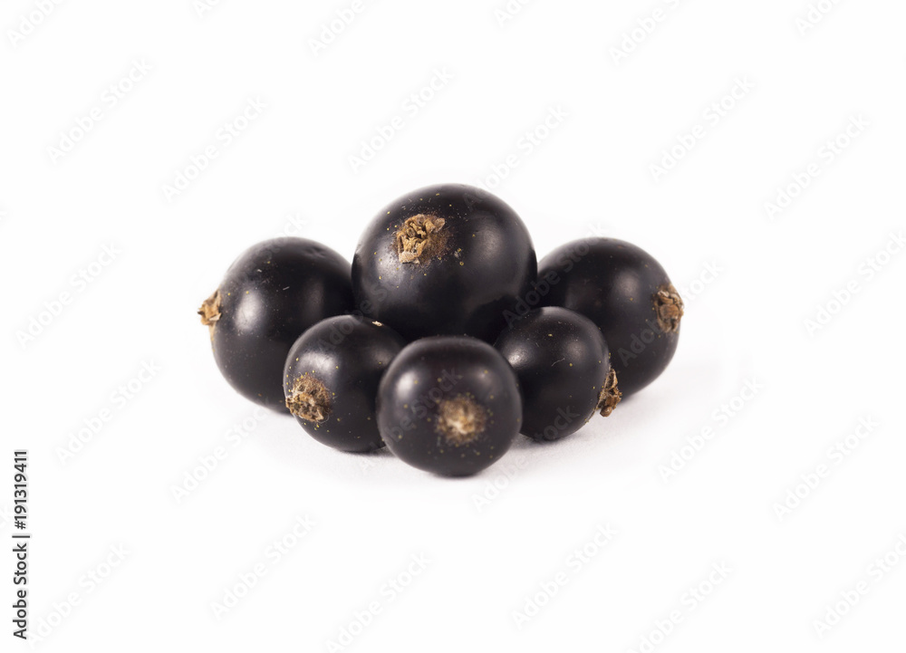 Selective focus. Blackcurrant with copy space for text. Ripe and tasty black berry isolated on white. Currant on a white background. Selective focus. Blackcurrant with copy space for text. Ripe and tasty black berry isolated on white. Currant on a white background.