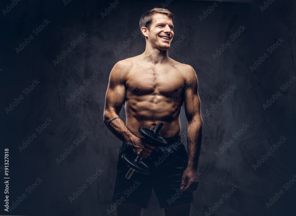 Fototapeta premium Studio portrait of a shirtless athletic tattooed male