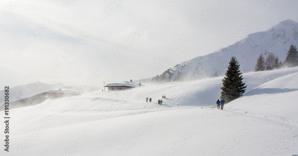 Snowstorm in the mountains at winter time. Mountains of Trentino Alto Adige, South Tyrol Snowstorm in the mountains at winter time. Mountains of Trentino Alto Adige, South Tyrol