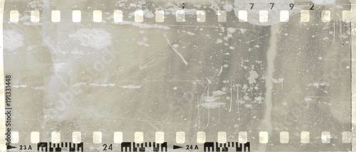 Grunge dripping film strip frame in gray tones.