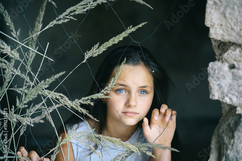 Fotografi Young girl with adorable blue eyes, long hair, beauty