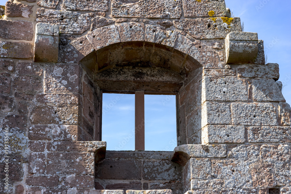 Empty window in the wall of a ruin Empty window in the wall of a ruin