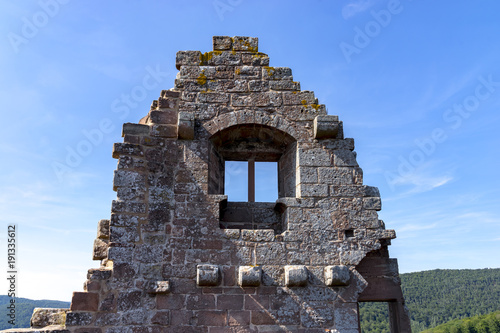Empty window in the wall of a ruin