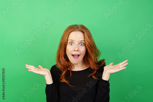 Bild auf Leinwand Young woman with a look of awed amazement