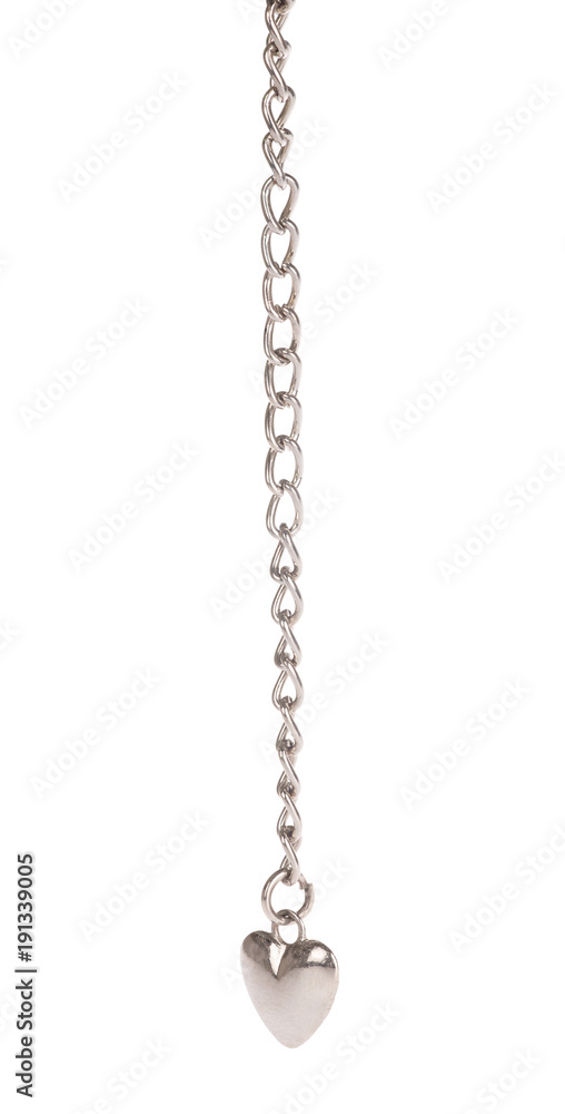 small steel heart and long chain on white small steel heart and long chain on white