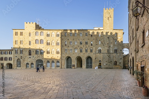 Pretorio Palace and Porcellino Tower, Priori square in a quiet moment of the afternoon, Volterra, Pisa, Tuscany, Italy