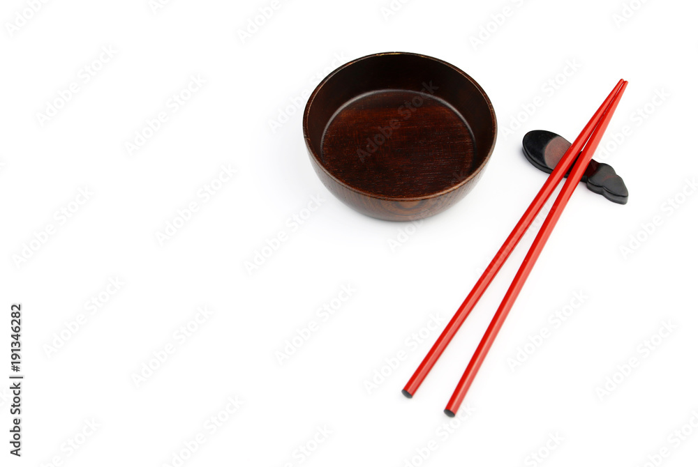 wood Chopsticks and Red bowl for sushi on White background Copy space wood Chopsticks and Red bowl for sushi on White background Copy space