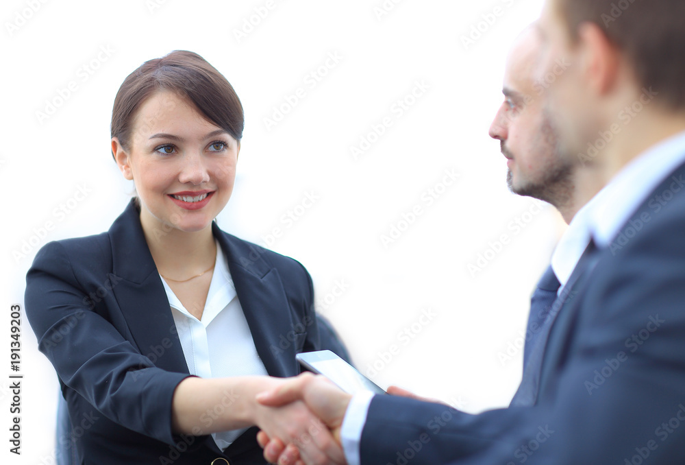 closeup of business woman shaking hands with her colleague. closeup of business woman shaking hands with her colleague.