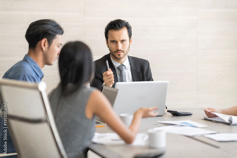 A businessman were having a discussion about their jobs. A businessman were having a discussion about their jobs.