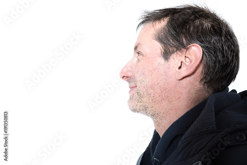 portrait of a forty-five year old man in studio on a white background