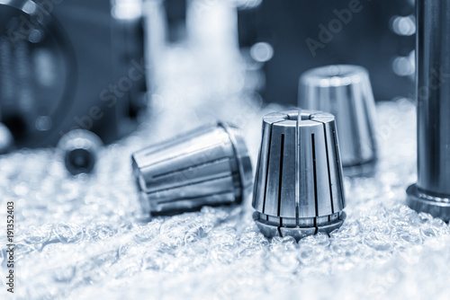 The CNC part ,collet spare parts on the floor. photo