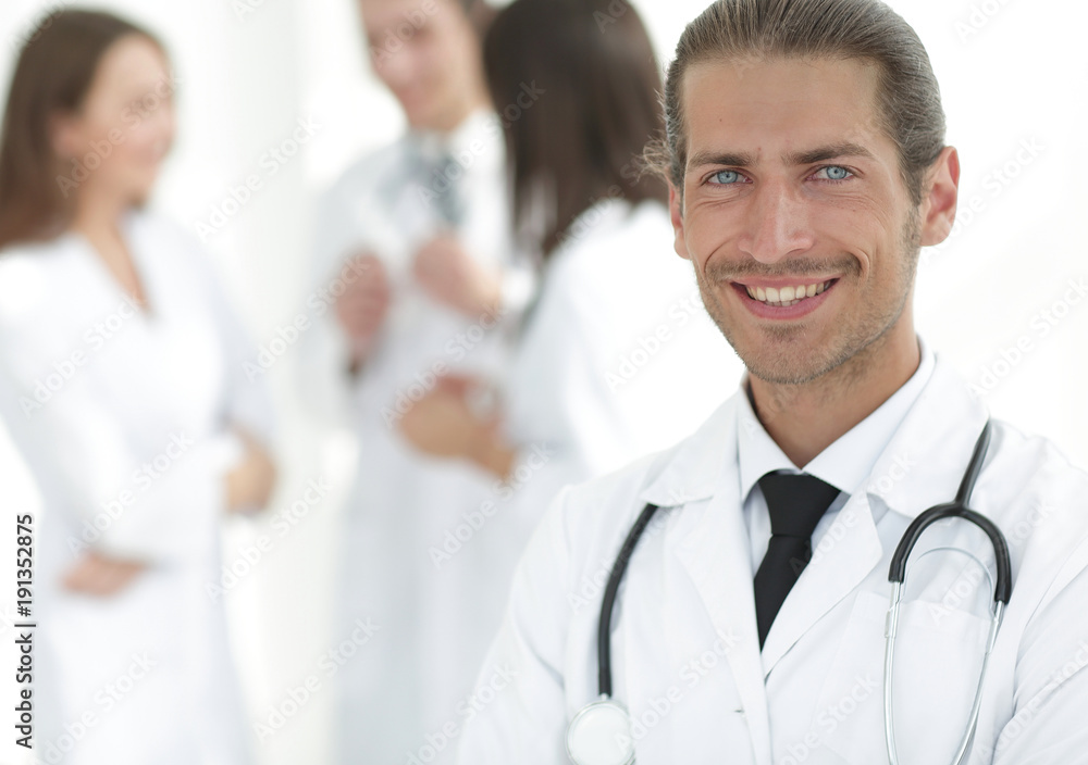 smiling doctor therapist on blurred background. smiling doctor therapist on blurred background.