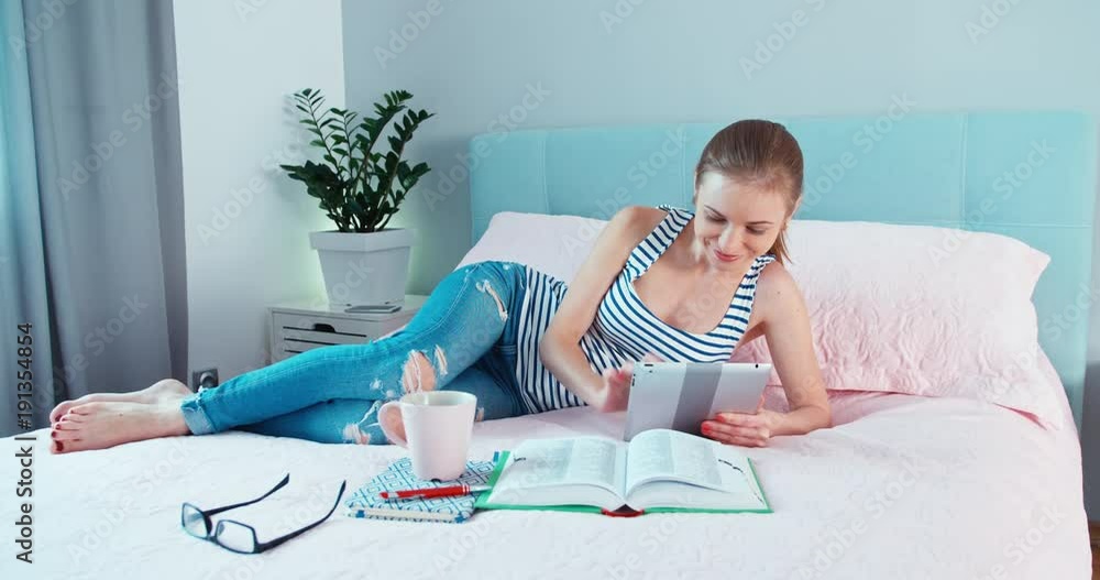 Studying online at home. Stretching student Studying online at home. Stretching student