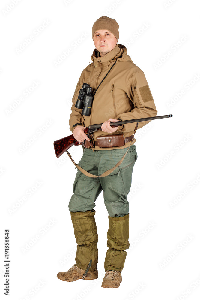 Full length portrait of a male hunter with double barreled shotgun Isolated on white background. hunting and people concept. Full length portrait of a male hunter with double barreled shotgun Isolated on white background. hunting and people concept.