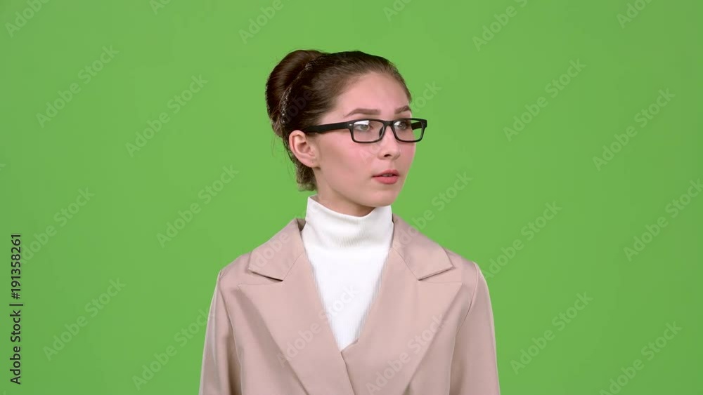 Woman thinks about serious issues and finds a solution. Green screen. Slow motion Woman thinks about serious issues and finds a solution. Green screen. Slow motion