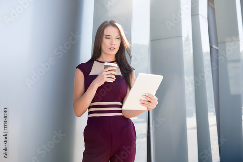 Portrait of confident young businesswoman outdoors