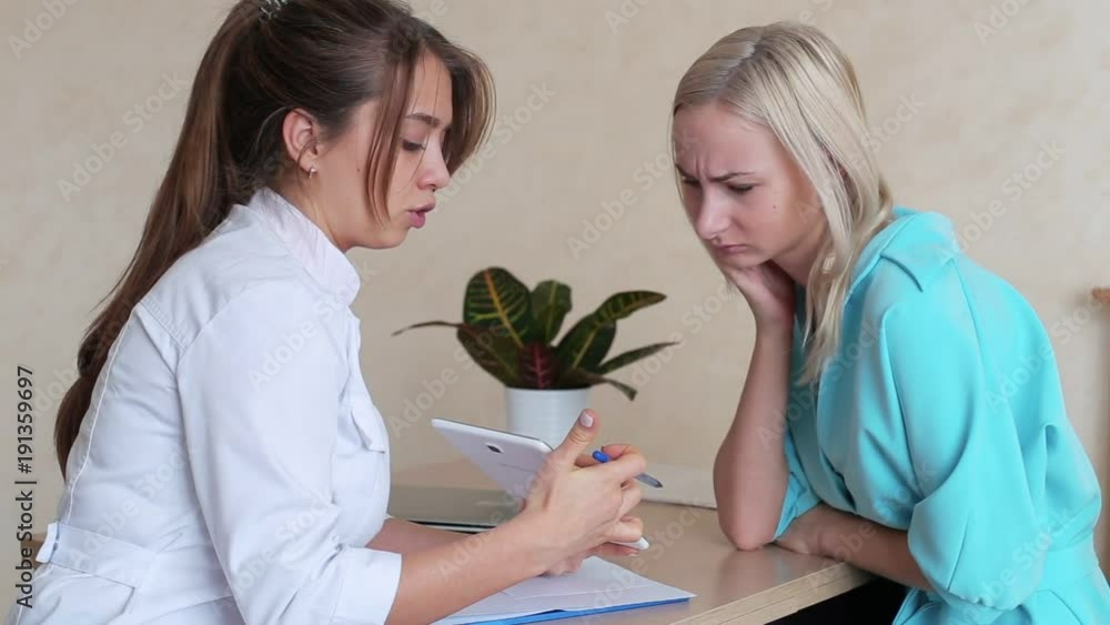 Doctor giving consultation to patient Doctor giving consultation to patient