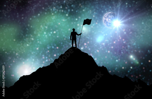 Photography silhouette of businessman with flag on mountain