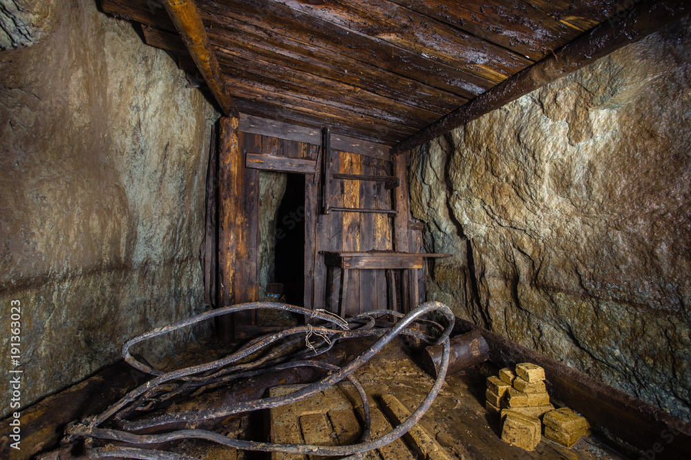 Underground abandoned ore mine shaft tunnel gallery pumping room
