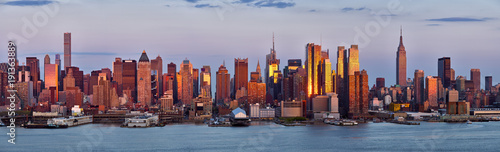 Panoramic view, skyscrapers of Midtown Manhattan at sunset with the Hudson River. New York City