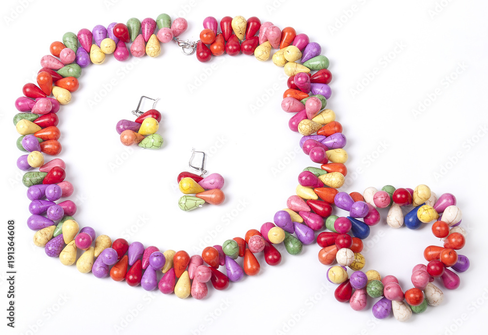Necklace with stones on a white background. Bijouterie. Women's accessories. Necklace on the neck. Valuable jewelry.Decorating for women.Women's accessories isolated white background Necklace with stones on a white background. Bijouterie. Women's accessories. Necklace on the neck. Valuable jewelry.Decorating for women.Women's accessories isolated white background
