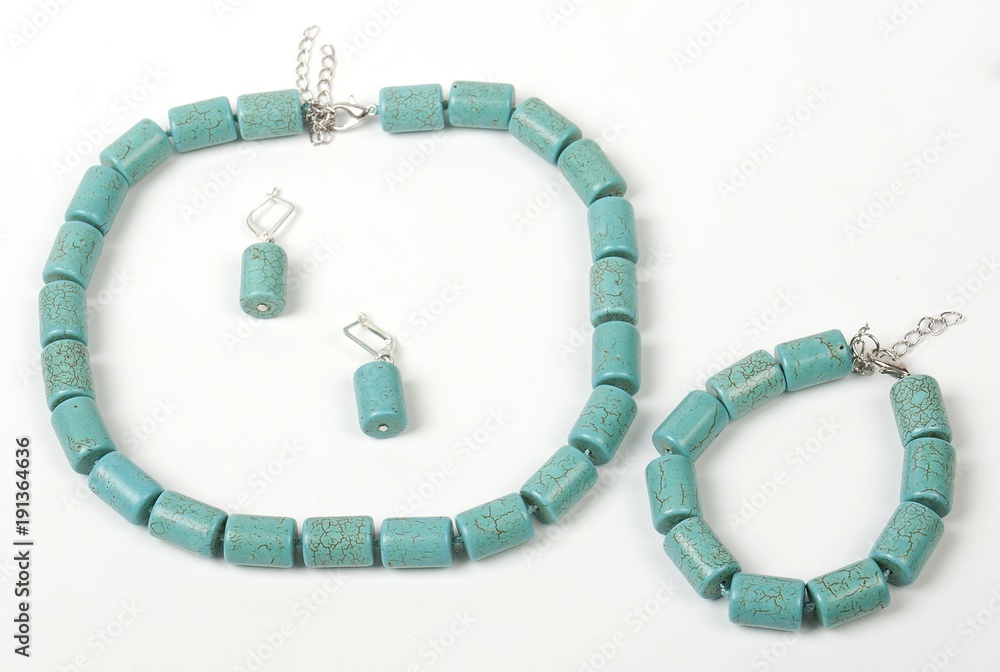 Necklace with stones on a white background. Bijouterie. Women's accessories. Necklace on the neck. Valuable jewelry.Decorating for women.Women's accessories isolated white background Necklace with stones on a white background. Bijouterie. Women's accessories. Necklace on the neck. Valuable jewelry.Decorating for women.Women's accessories isolated white background
