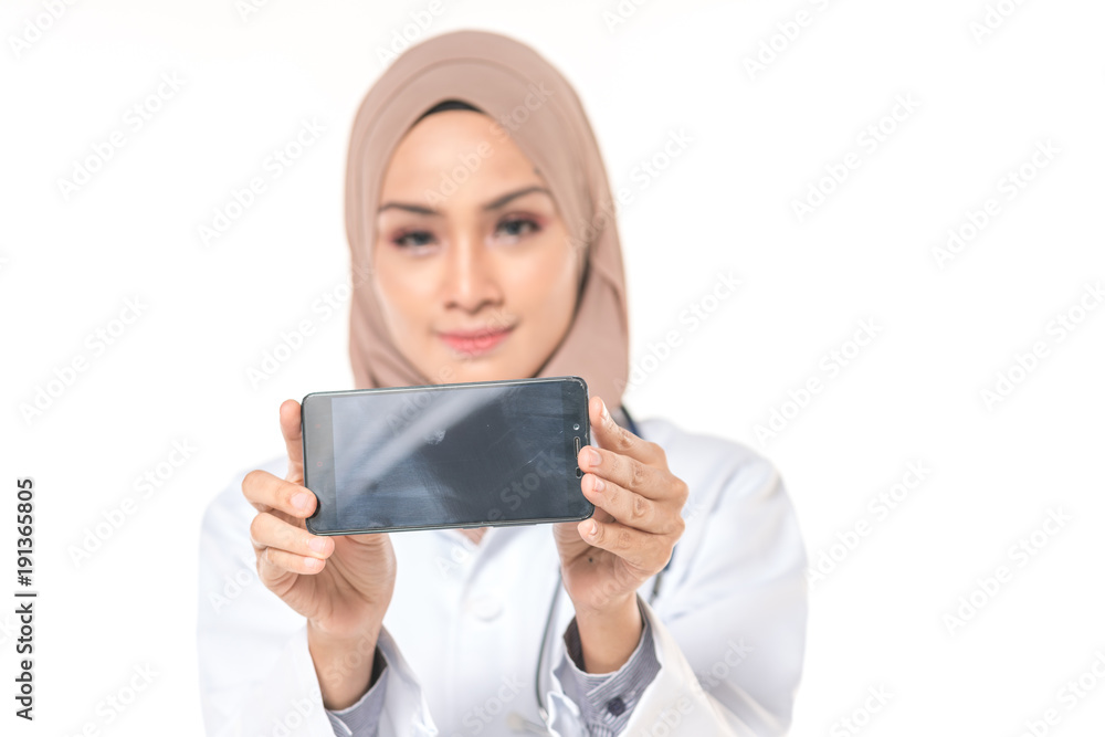 Hijab medical doctor use a phone. Healthy concept. Hijab medical doctor use a phone. Healthy concept.
