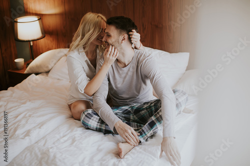 Loving couple on the bed