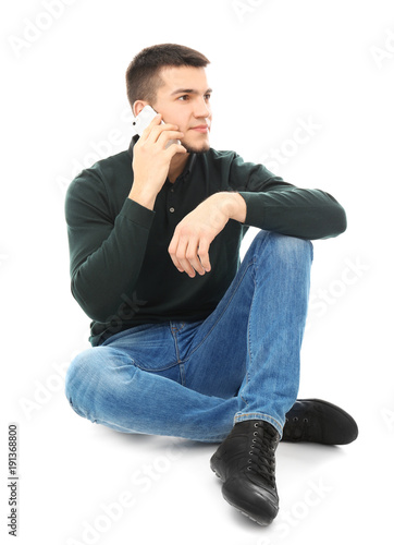 Young man talking on cell p...