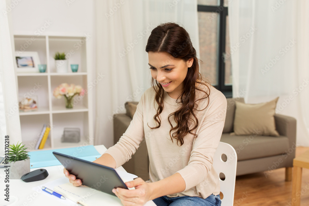 student or freelancer with tablet pc at home student or freelancer with tablet pc at home
