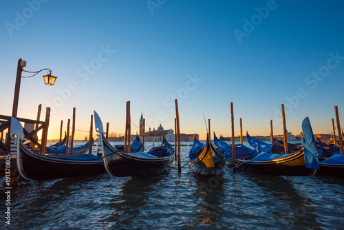 Gondola boats. Venice Italy gondola boats at seafront near San Marco square at sunrise. © nevodka.com