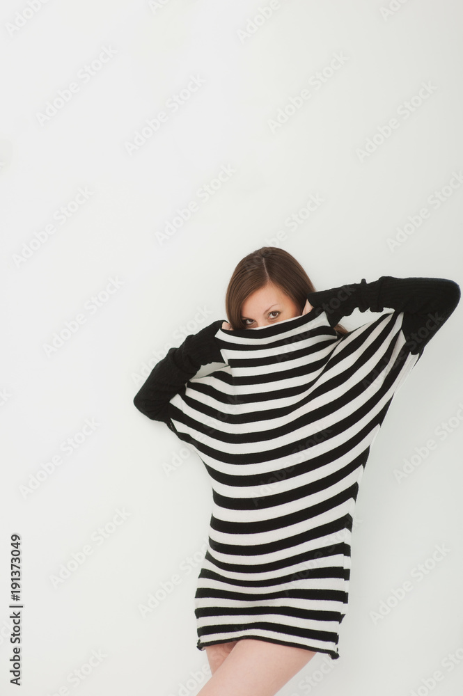Beautiful fashion pregnant young happy brunette woman in striped black white dress with big belly, tummy. Pregnancy, parenthood, family, motherhood, parents, children, people and expectation concept. Beautiful fashion pregnant young happy brunette woman in striped black white dress with big belly, tummy. Pregnancy, parenthood, family, motherhood, parents, children, people and expectation concept.