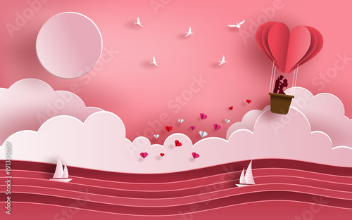 Cute couple in love hugging, staring at each other's eyes and standing inside a basket of an air balloon, traveling across the ocean, paper art style, flat-style vector illustration.