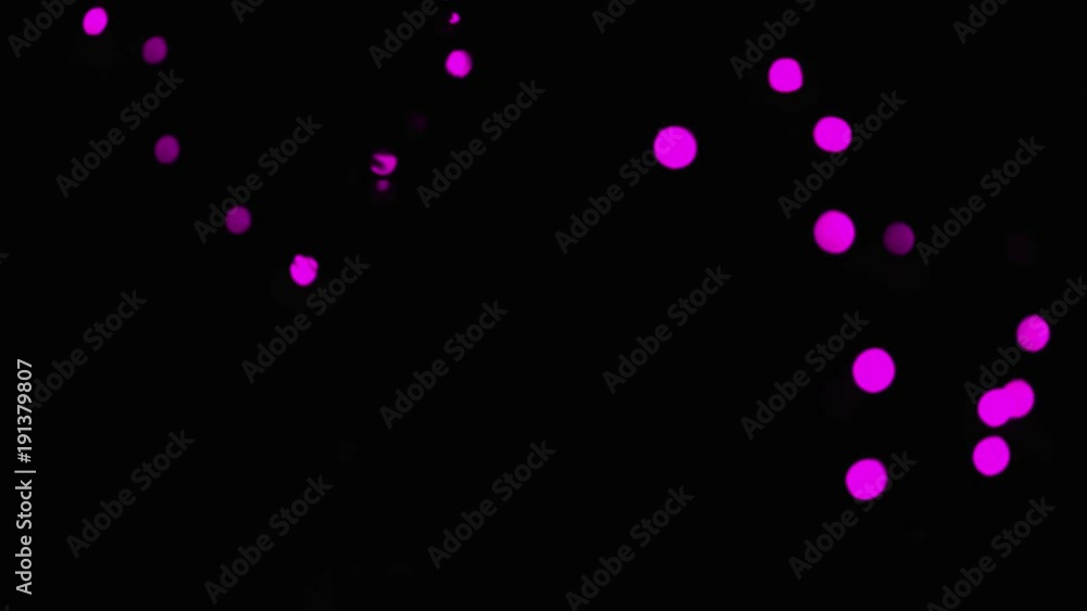 Lights pink of bokeh. Movement to top. Lights pink of bokeh. Movement to top.