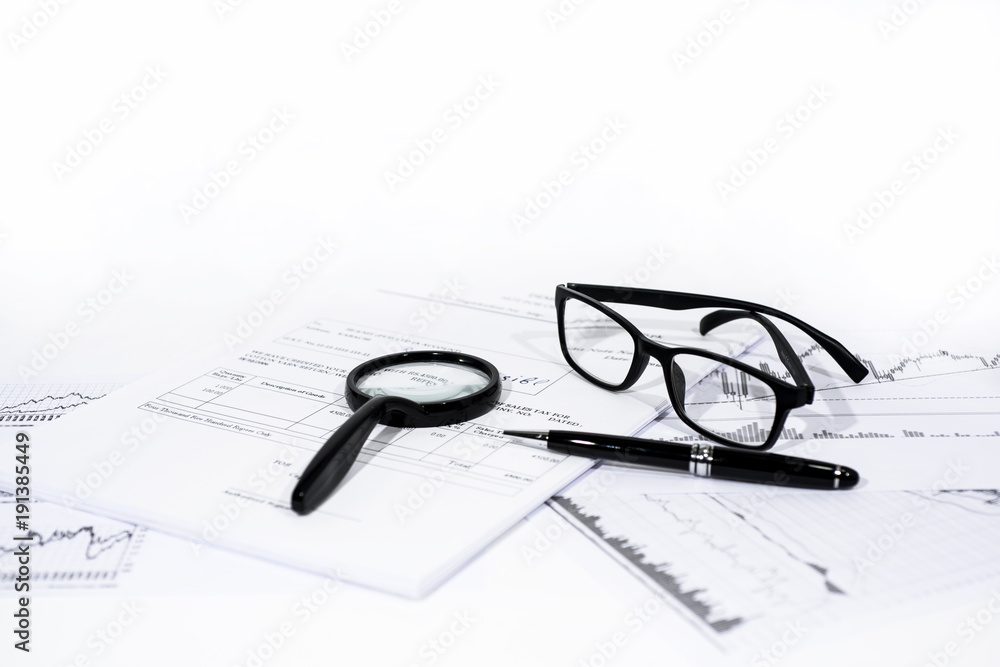Abstract photo of documents. Documents on white table with some decorations. Abstract photo of documents. Documents on white table with some decorations.