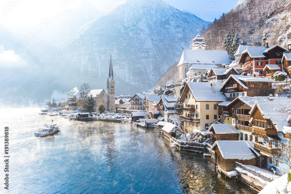 Town of Hallstatt with ship in winter, Salzkammergut, Austria