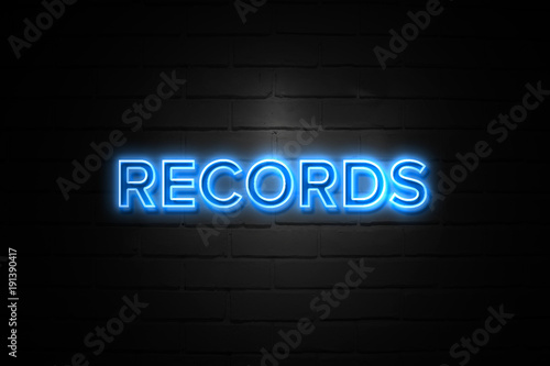 Records neon Sign on brickwall