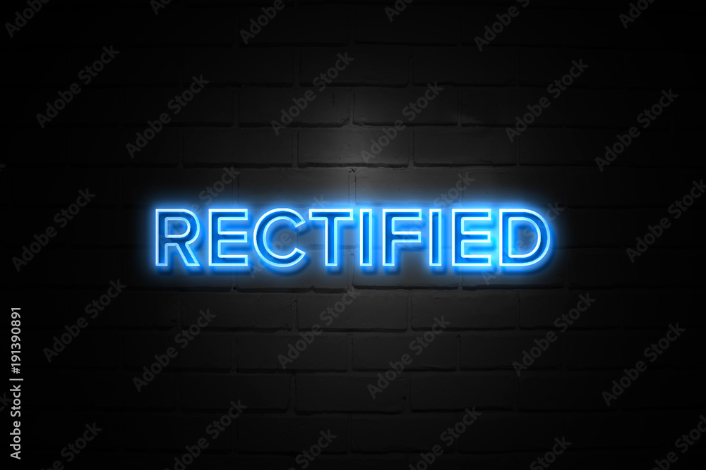 Rectified neon Sign on brickwall
