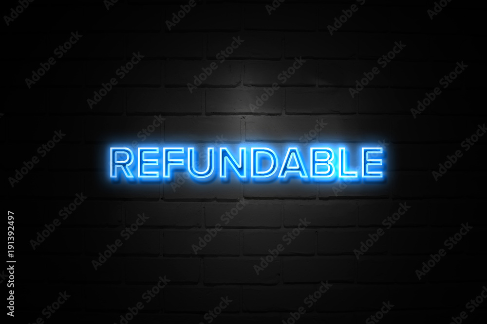 Refundable neon Sign on brickwall Refundable neon Sign on brickwall