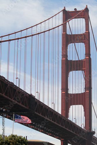 American flag in front of Golden Gate Bridge
