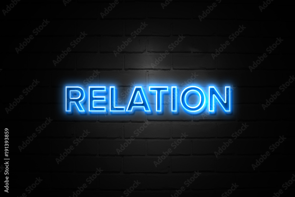Relation neon Sign on brickwall Relation neon Sign on brickwall