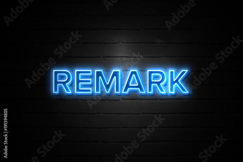 Remark neon Sign on brickwall