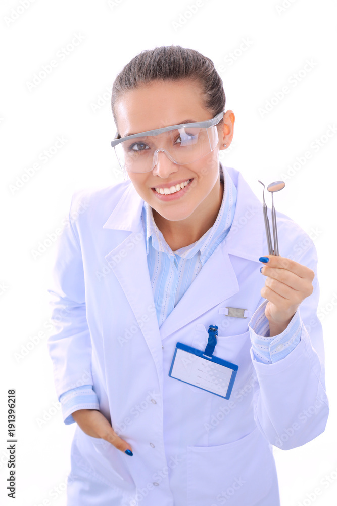 Beautiful female dentist doctor holding and showing a toothbrush isolated on a white background. Dentist doctor Beautiful female dentist doctor holding and showing a toothbrush isolated on a white background. Dentist doctor